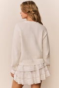 Ivory knit pullover sweater with tiered ruffle hem detail