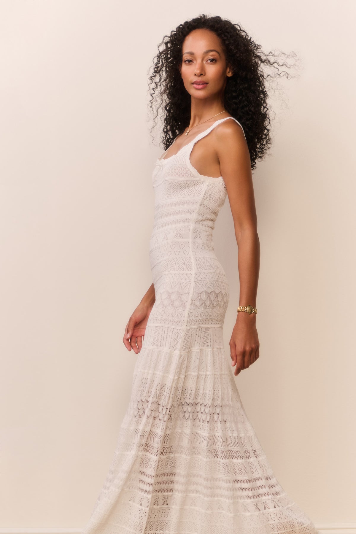 White pointelle maxi sundress with thin straps and tiered lace-like knit panels