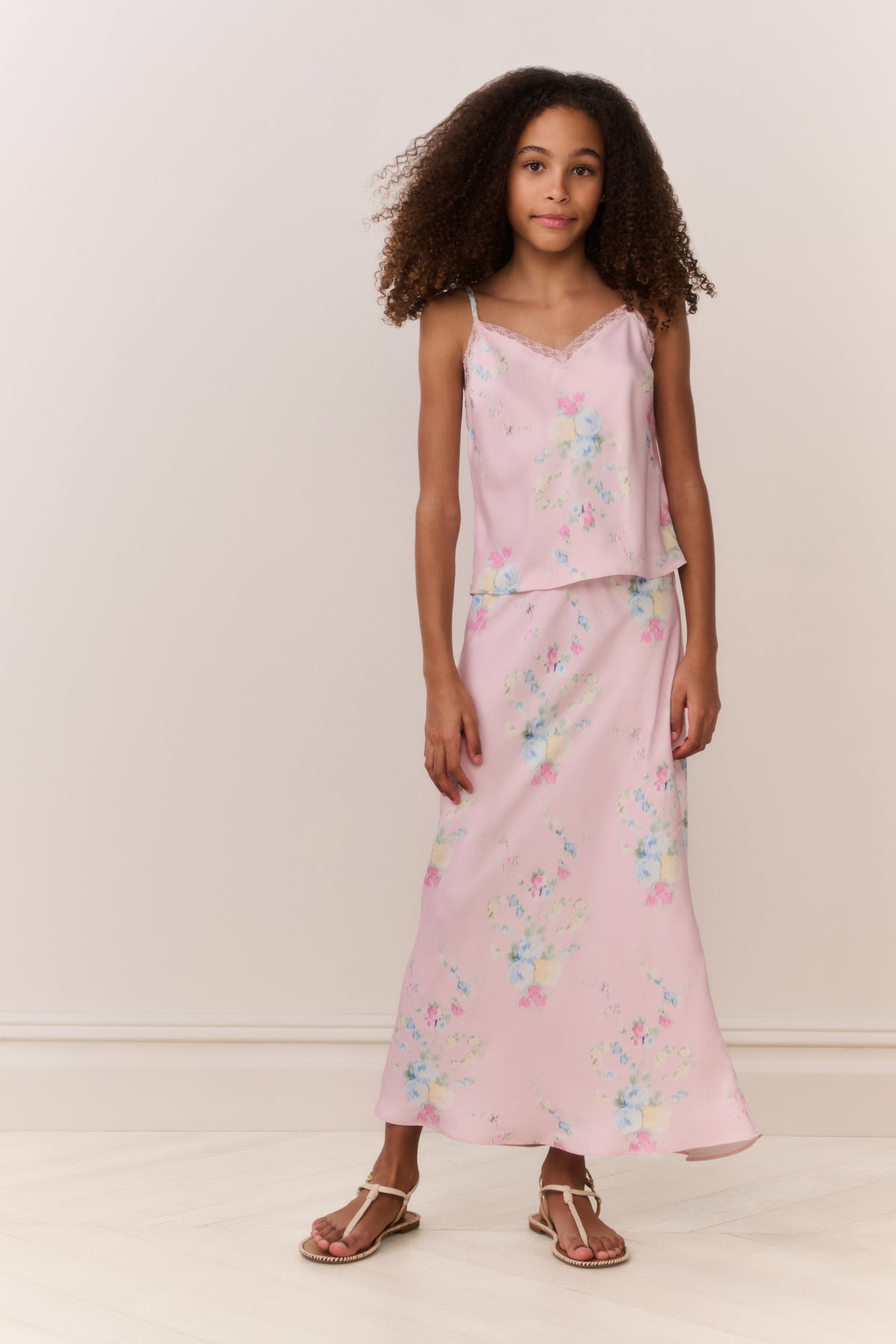 Light pink floral maxi skirt with delicate pastel bloom print