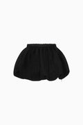 Black bubble skirt back view with elastic waist and rounded gathered hem