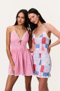 Pink gingham cotton mini dress with halter tie front and thin spaghetti straps