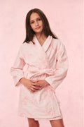 Kids cotton bath robe, pale pink patterned fabric, hood with tie belt at waist.