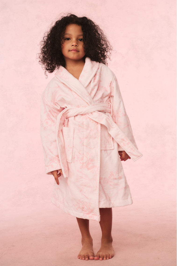 Kids cotton bath robe, pale pink with all-over pattern, hooded wrap and belt tie.