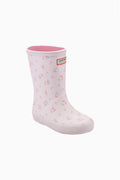 Kids rain boot with light pink floral pattern and molded Hunter logo badge.