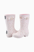 Pair of kids short rain boots in white with pink floral print and side buckles