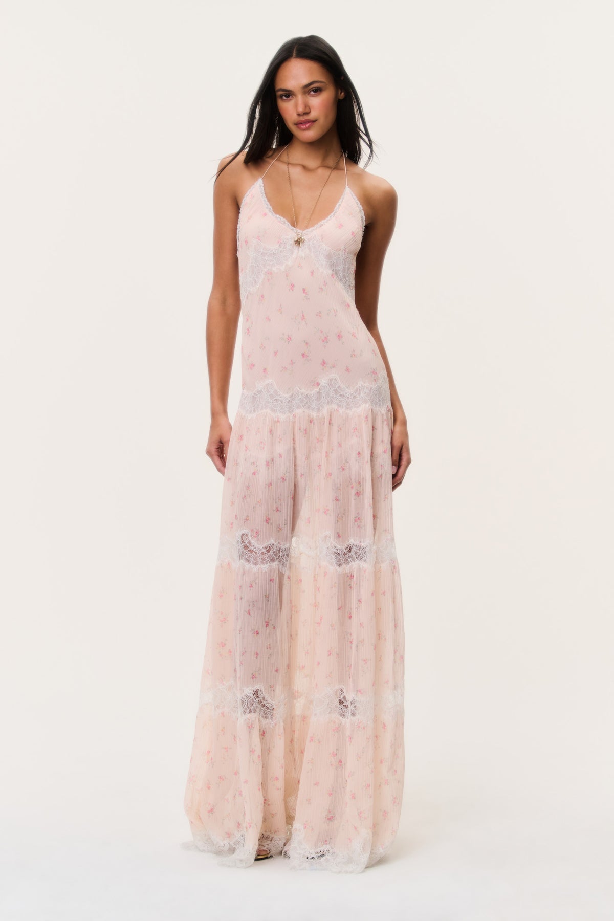Sheer pink floral maxi dress with lace-trimmed bodice and tiered skirt