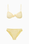 Marigold yellow polka-dot bikini set with knotted center bow and matching briefs