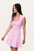 Candy pink sleeveless pointelle mini dress with scoop neckline and tiered ruffle hem
