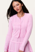 Stretch pointelle cardigan in candy floss pink, button-front with scalloped trim