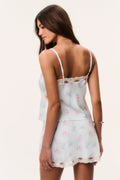 Mini satin slip skirt in pastel floral print with scalloped lace hem
