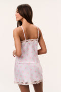 Pink floral mini satin slip skirt with scalloped lace hem and back view