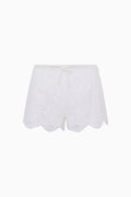 Ivory lace mini shorts with scalloped hem and tied waist ribbon