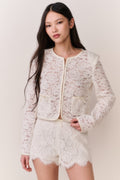 Ivory cropped lace jacket with long sleeves, scalloped cuffs, zipper front