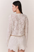 Ivory lace mini shorts with scalloped hem and detailed lace, back view