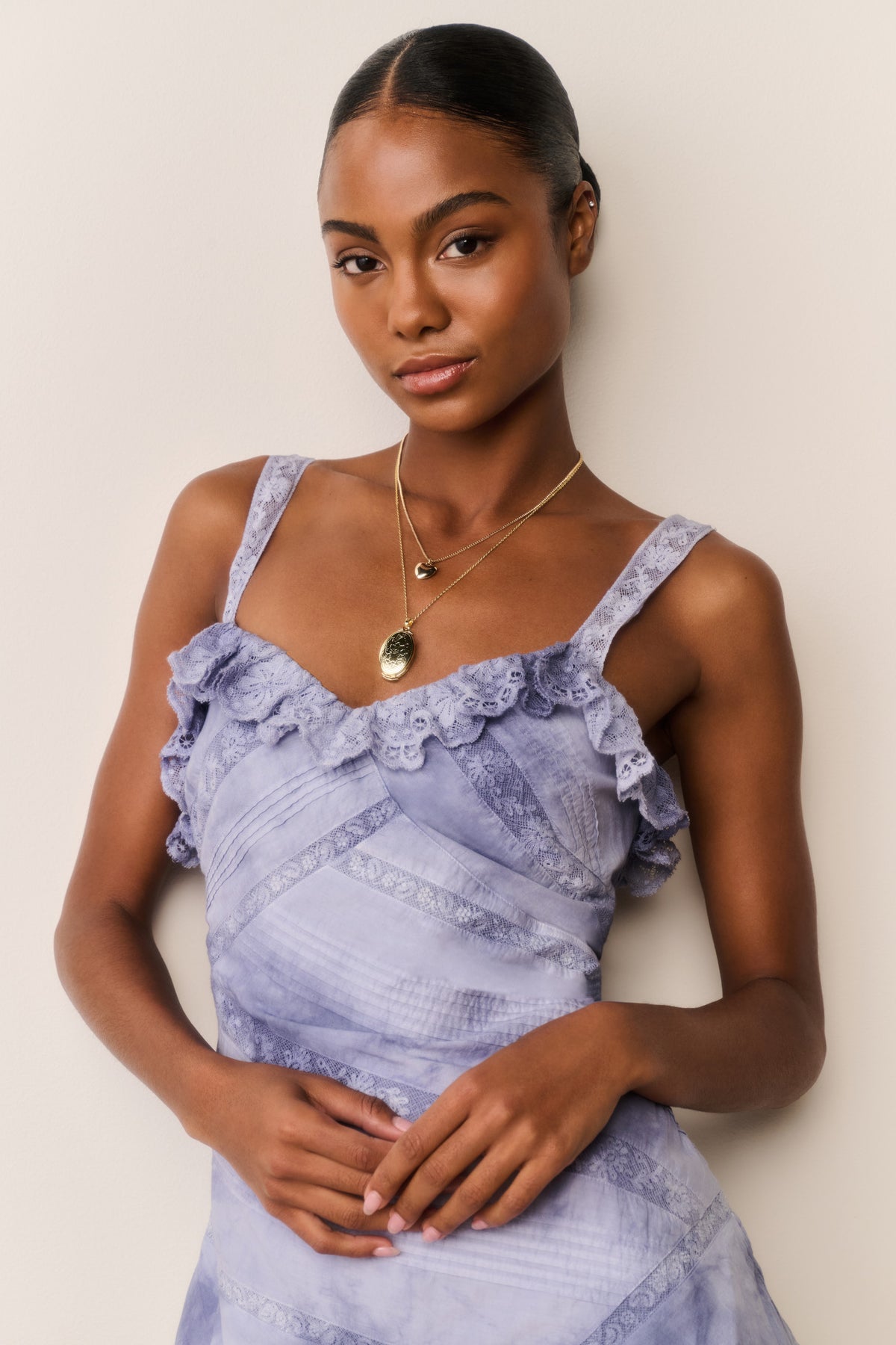 Indigo hand-dyed cotton mini dress with V neckline and lace-trim ruffle details