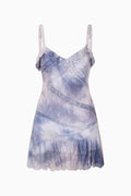 Indigo hand-dyed cotton mini dress with spaghetti straps and tiered ruffle hem