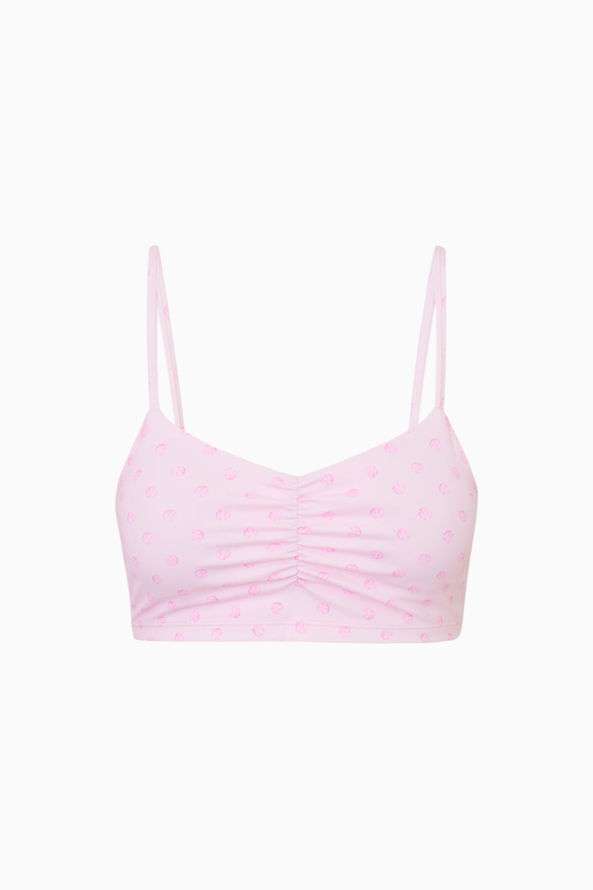 Pink patterned sports bra with thin spaghetti straps and ruched bust