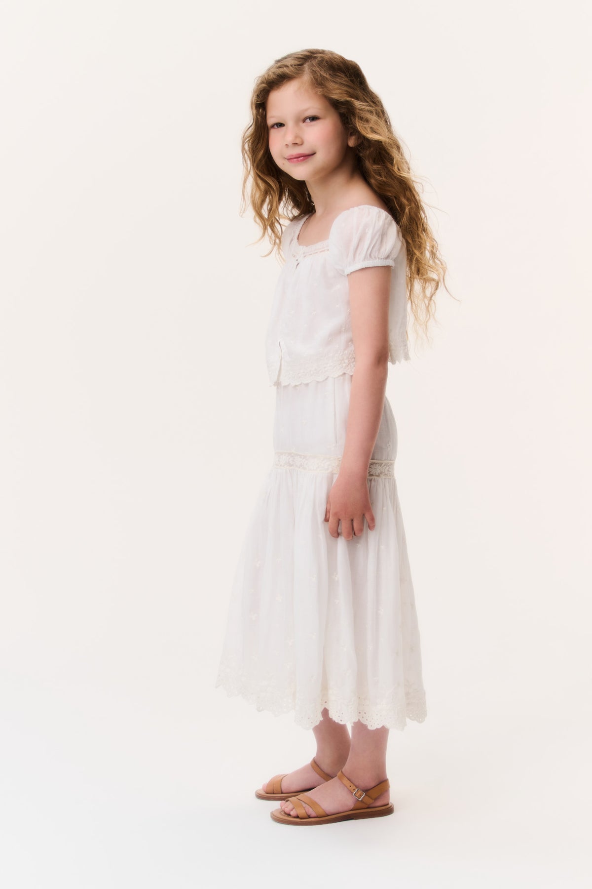 Ivory cotton lace girls' tiered skirt with elastic waistband, short ruffle layers