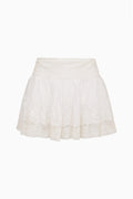 Ivory cotton mini skirt with lace-trim hem and gathered tiers