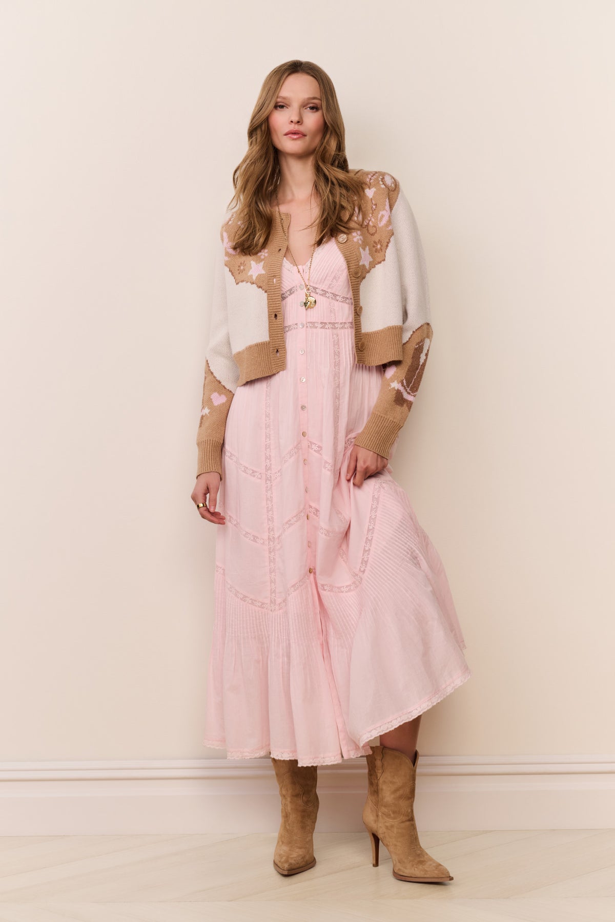 Wool-blend cardigan with long sleeves, button front, and teddy-and-star intarsia styling