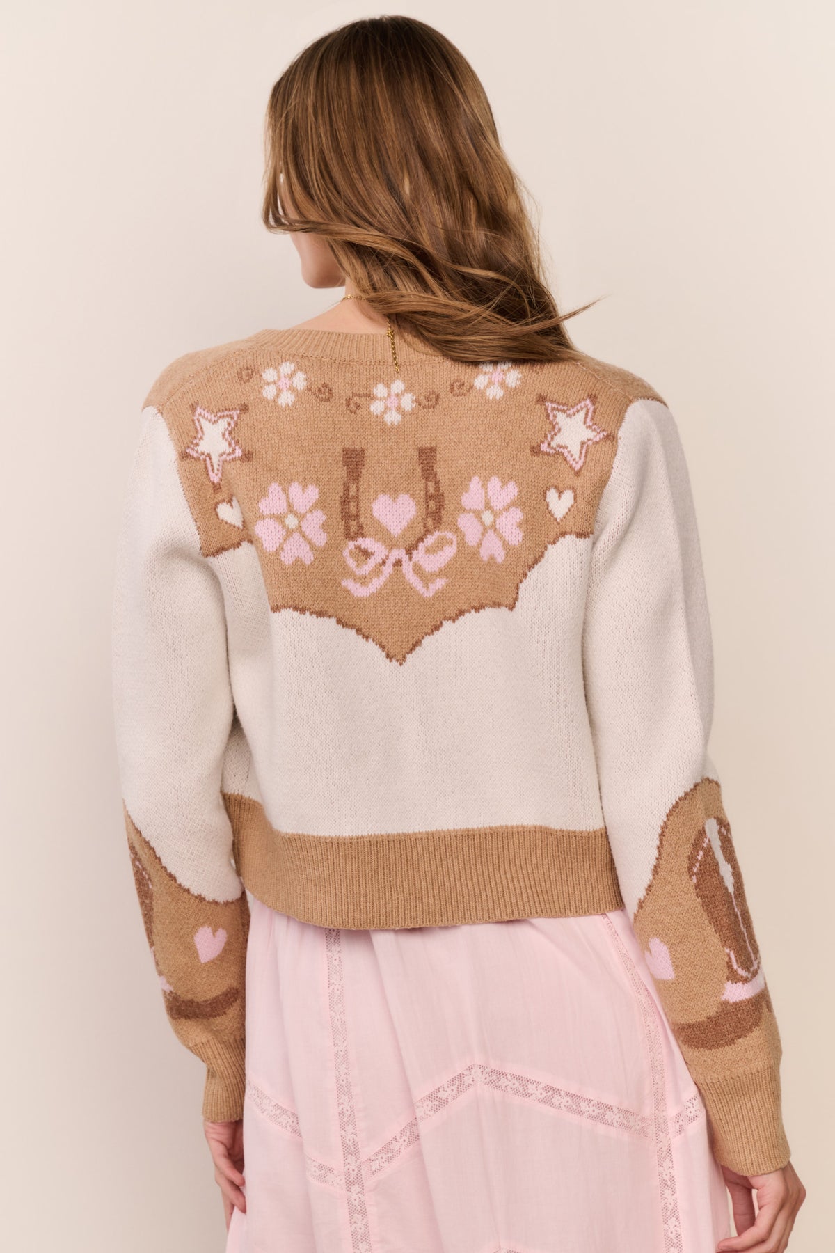 Back view wool-blend cardigan with button details and knit heart-and-star motif yoke