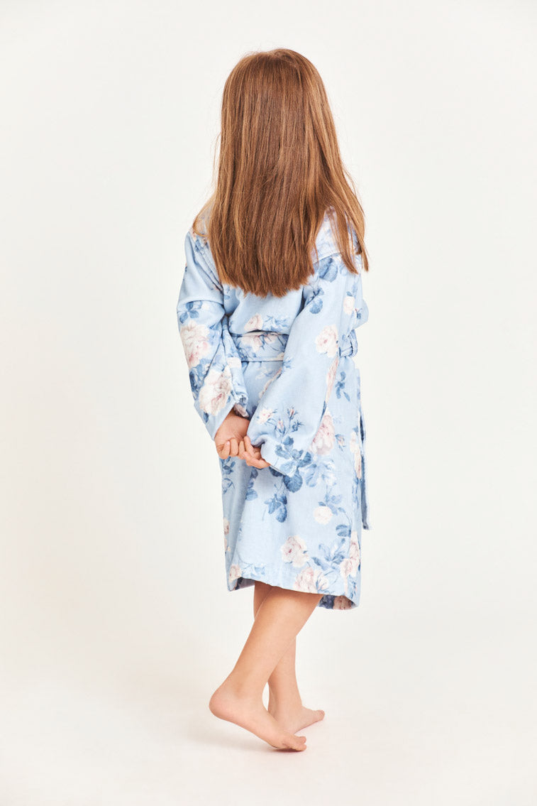 Kids cotton bath robe, light blue floral print, back view with belt tie.