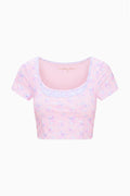 Lilac mixed-print active crop top, flat lay front view with scoop neck and short sleeves