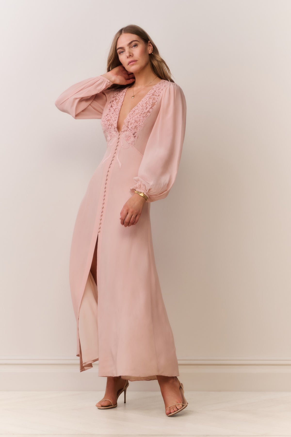 Light pink silk maxi dress with lace V-neck and draped sheer sleeves