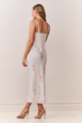 Floral print slip skirt shown from back, with lace-trim hem