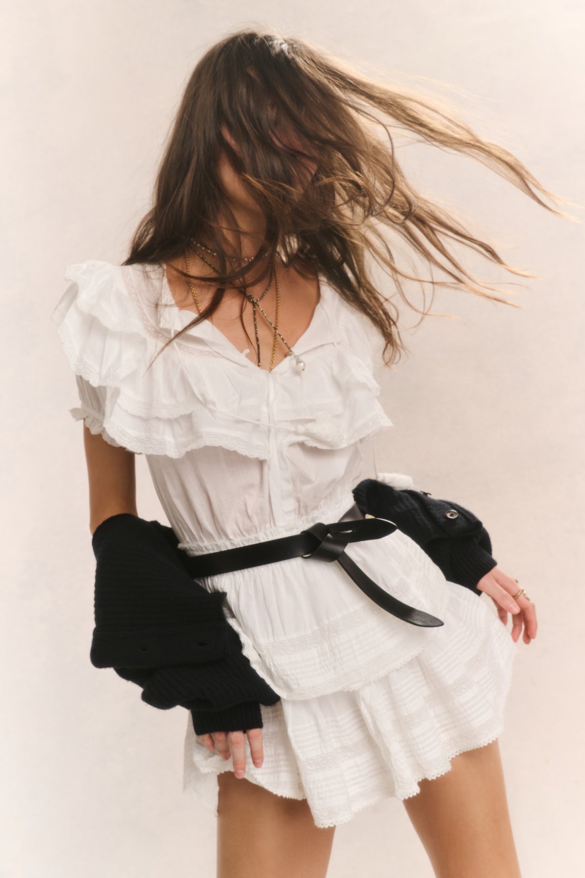 Antique white ruffled cotton mini dress with ruffle sleeves, tiered skirt, V-neck
