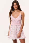 Pink floral cotton mini dress with spaghetti straps and tiered ruffle skirt