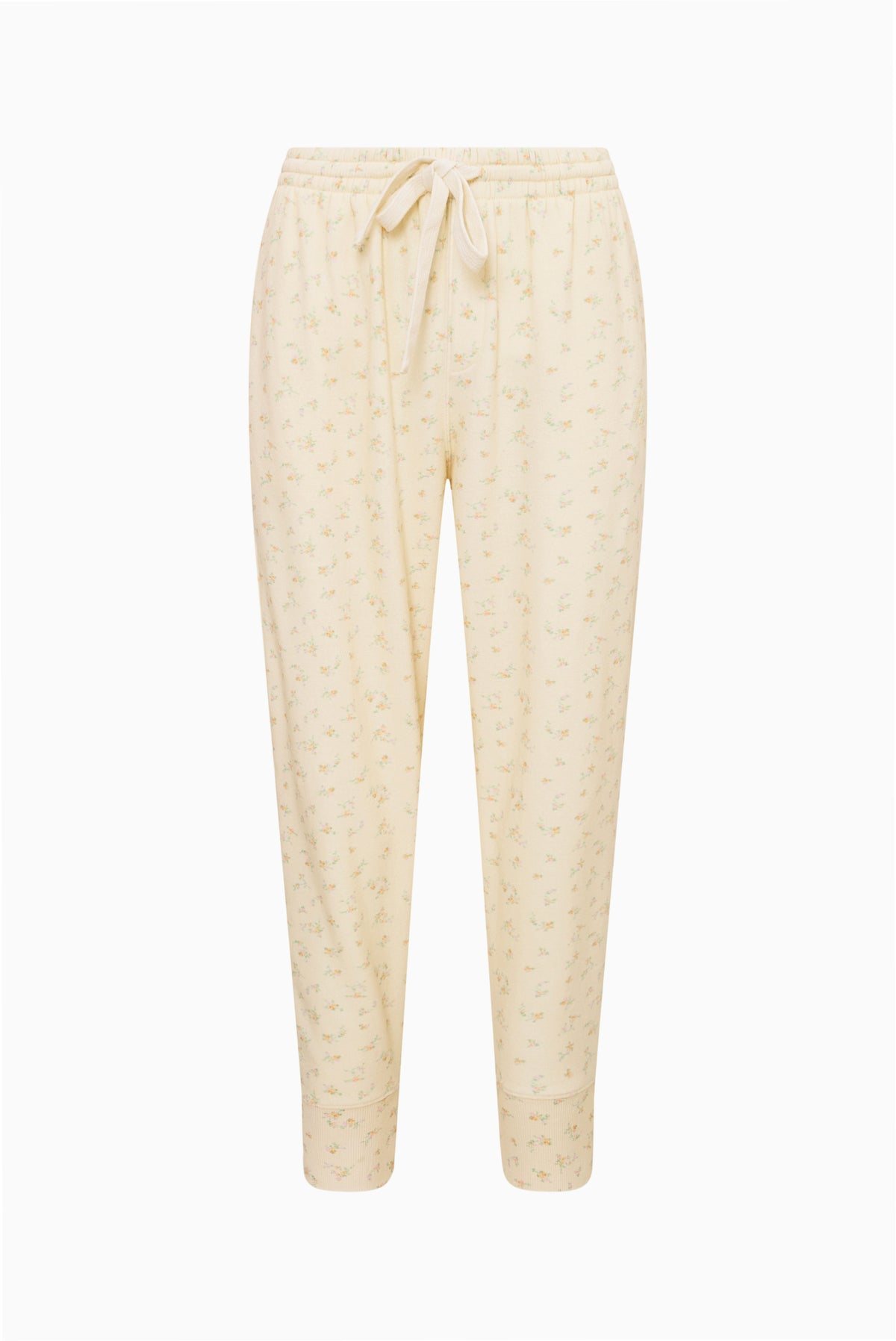 Ditsy floral sweatpants, pale yellow/cream with drawstring waist and tapered cuffs