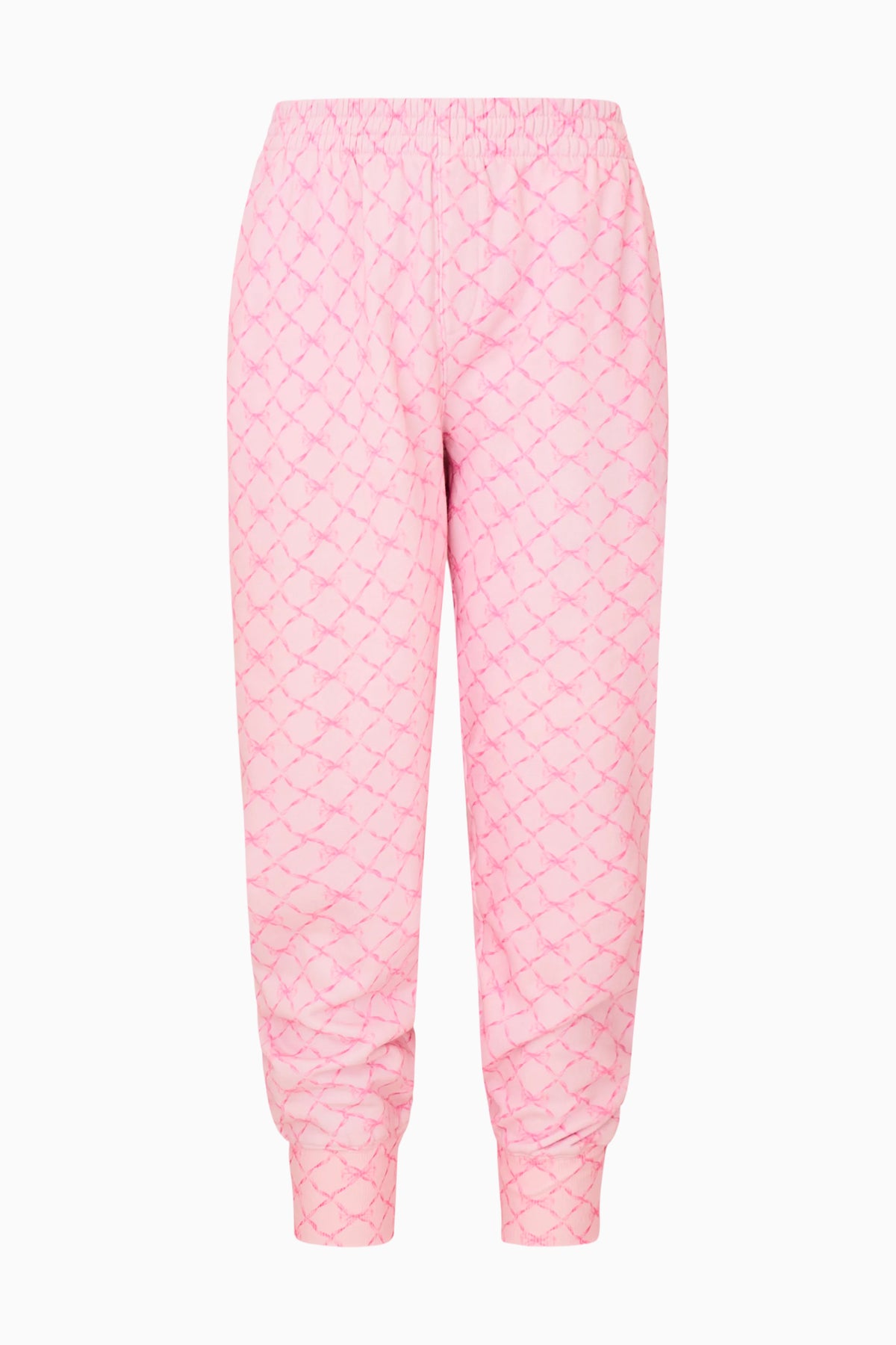 Pink printed cotton sweatpants with elastic cuffs and relaxed tapered legs
