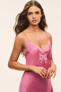 Pink lace bow maxi dress with lace bodice detailing and thin spaghetti straps