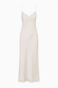 Alabaster lace-bow maxi dress with lace spaghetti straps and scalloped bottom