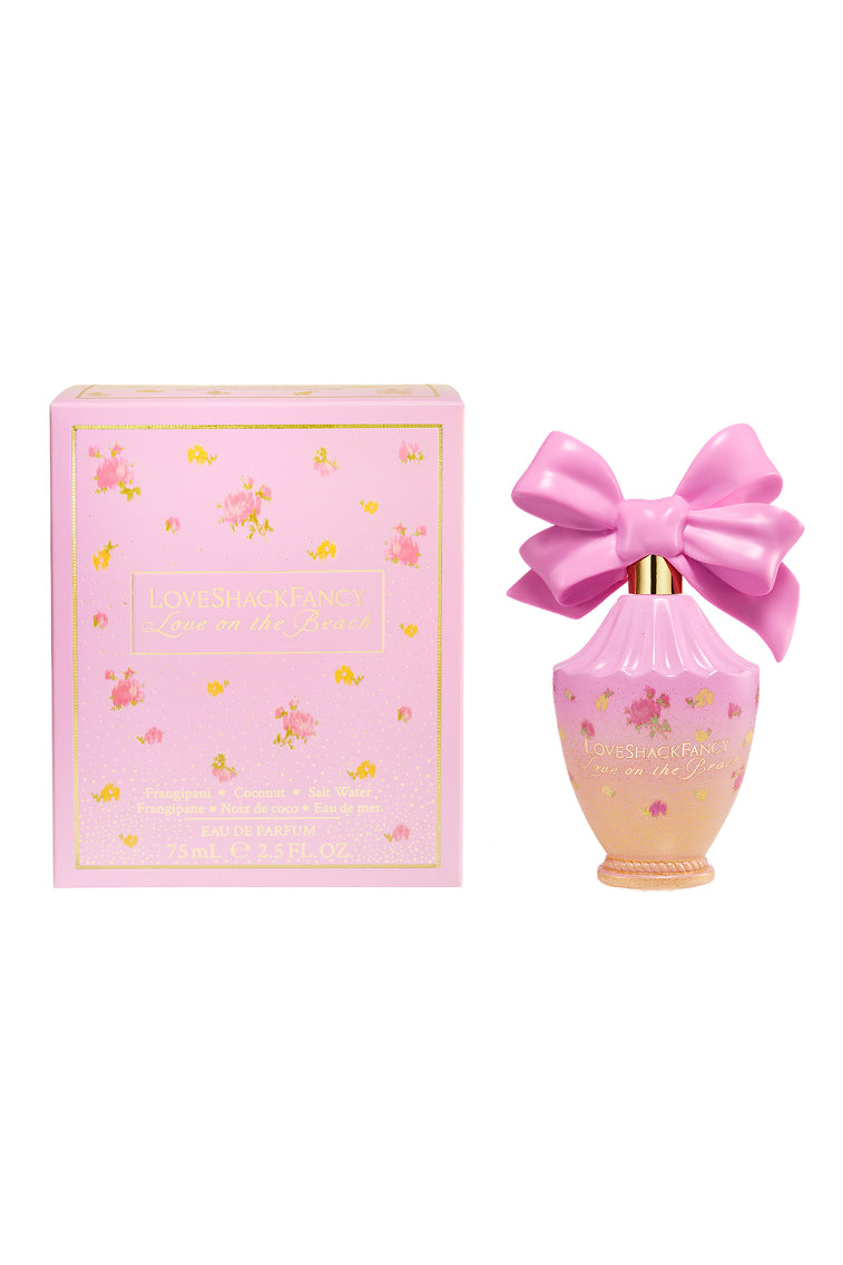 Pink LoveShackFancy Love on the Beach eau de parfum bottle with large bow and floral label