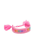 Pink woven bracelet with tassel and LoveShackFancy lettering