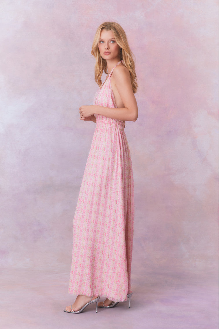 Pink floral halter maxi dress with smocked waist and flowing tiered skirt