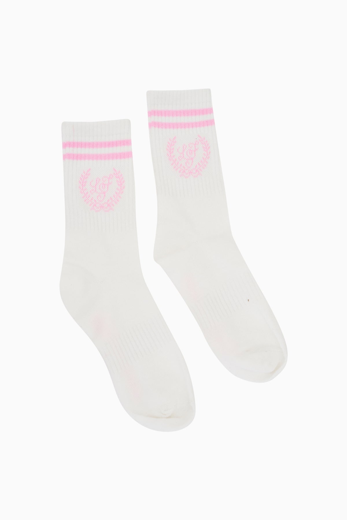 White crew socks with pink stripe cuffs and pink circular logo