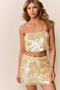 Pale lemon sequin mini skirt with flower motif, fitted mini length