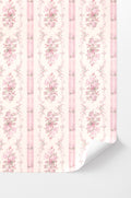 Peel-and-stick wallpaper corner with pink floral vertical stripe pattern