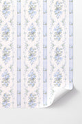 Peel-and-stick wallpaper with light blue floral pattern and vertical stripe accents