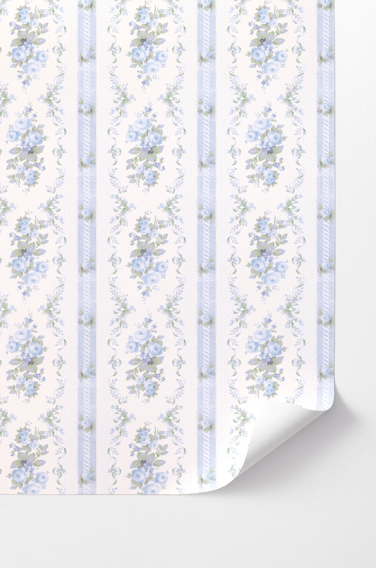 Peel-and-stick wallpaper with light blue floral pattern and vertical stripe accents