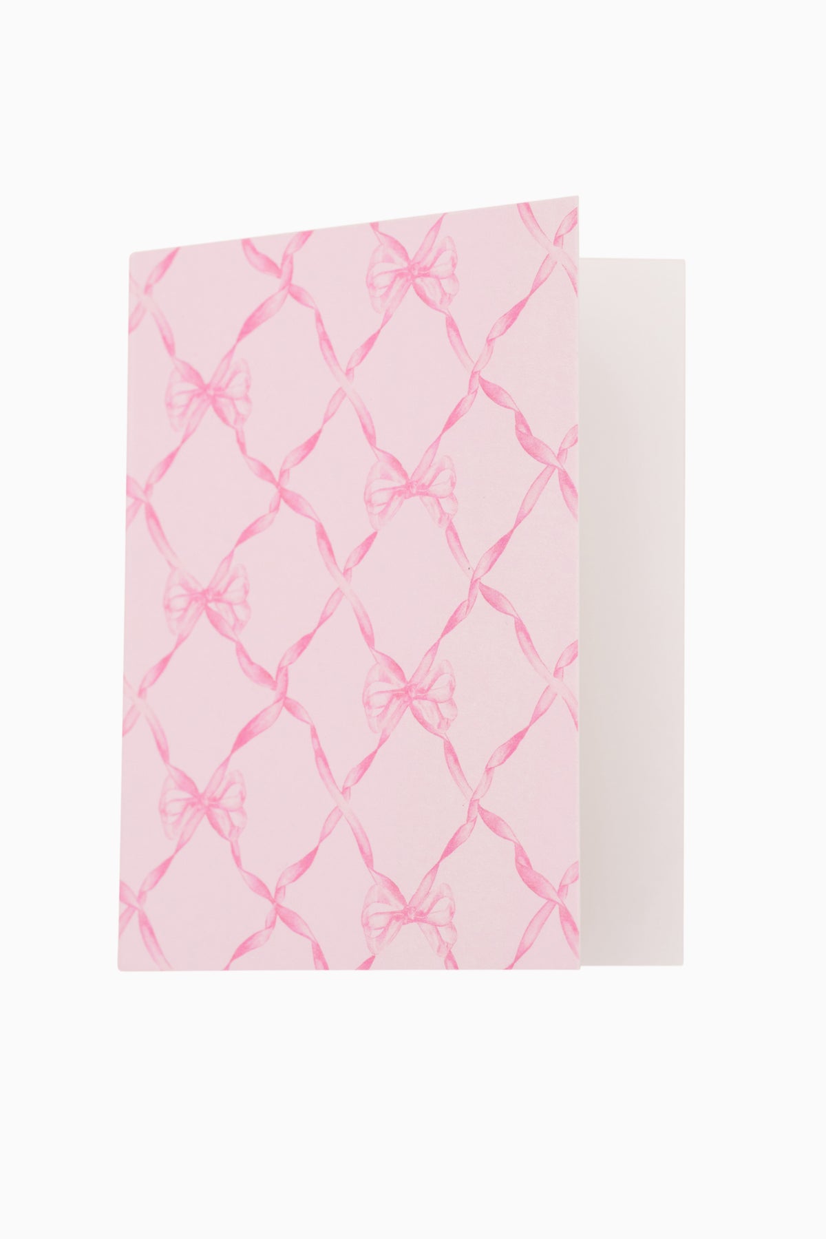 Card and envelope set with pink bow-pattern card and matching envelope