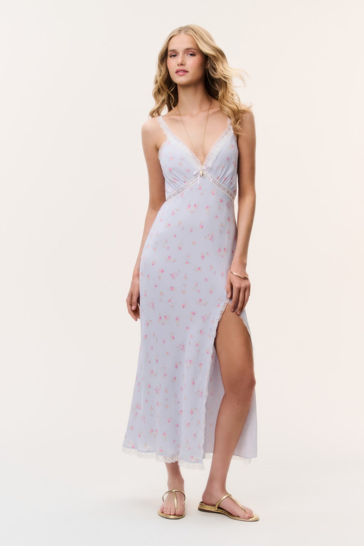 Light blue floral maxi dress with V-neck, spaghetti straps, corset seams, side slit