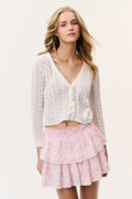 Pink floral ruffle mini skirt with tiered ruffle hem
