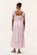 Pink floral cotton maxi dress, back view with smocked yoke and tiered hem