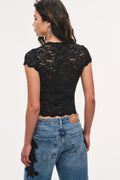 Black lace stretch tee with short sleeves, back view, scalloped neckline