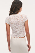 Ivory lace stretch tee with short sleeves, back view, scalloped crew neckline
