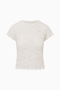 Ivory lace stretch tee with short sleeves and scalloped crew neckline